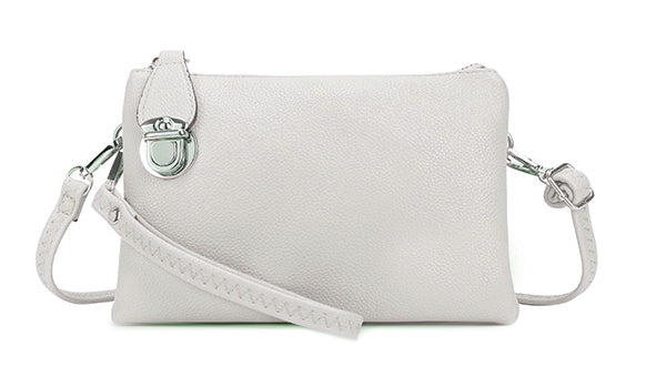 SMALL MULTI-POCKET CROSS BODY CLUTCH BAG WITH WRISTLET - CREAM