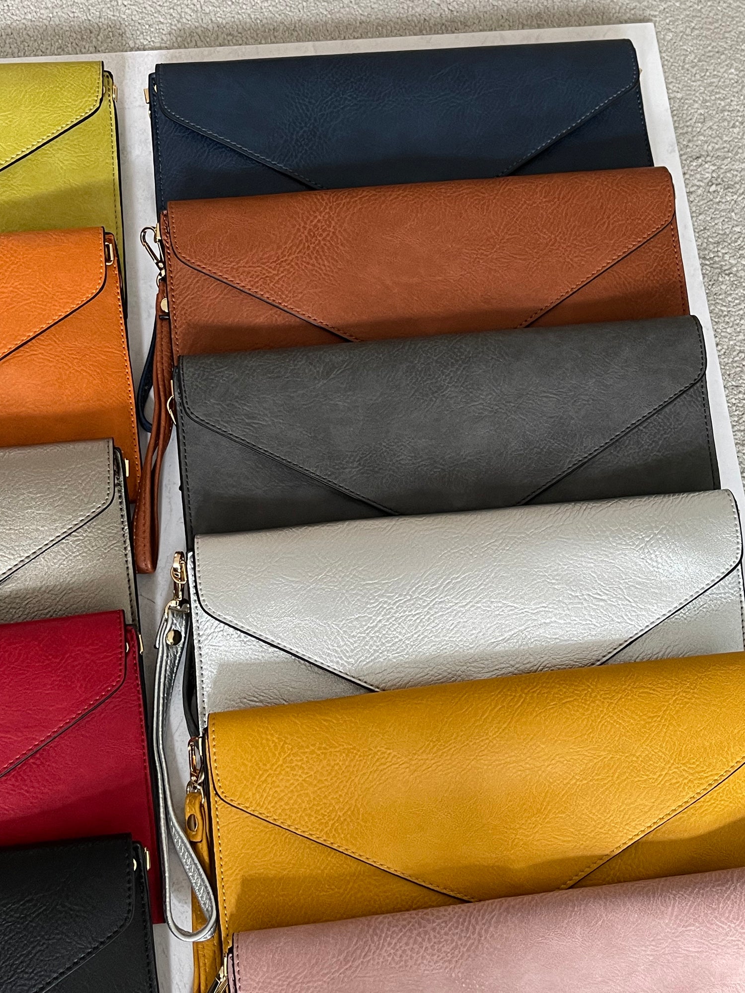 BROWN OVER-SIZED ENVELOPE CLUTCH BAG WITH LONG CROSS BODY AND WRISTLET STRAP