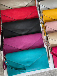 TURQUOISE OVER-SIZED ENVELOPE CLUTCH BAG WITH LONG CROSS BODY AND WRISTLET STRAP