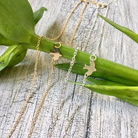A-SHU SHORT GOLD DELICATE FLYING BIRD CHARM NECKLACE - A-SHU.CO.UK