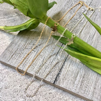 A-SHU SHORT GOLD DELICATE FLYING BIRD CHARM NECKLACE - A-SHU.CO.UK