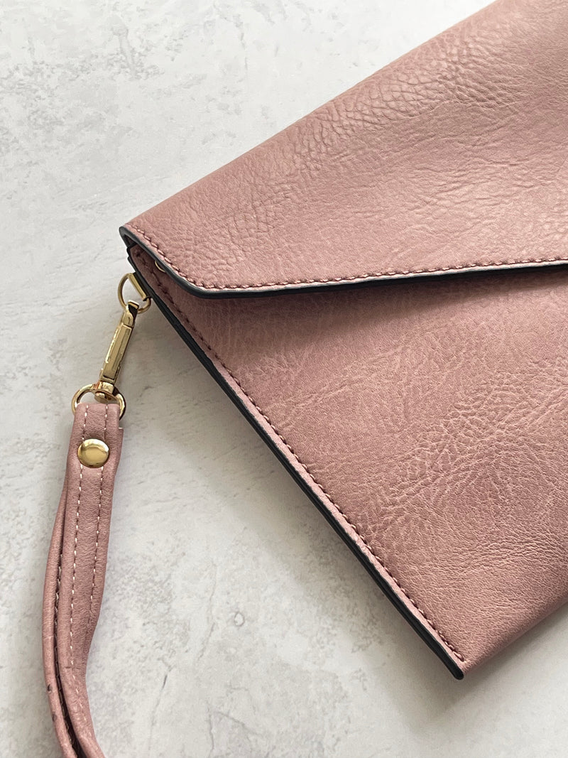 LIGHT PINK OVER-SIZED ENVELOPE CLUTCH BAG WITH LONG CROSS BODY AND WRISTLET STRAP