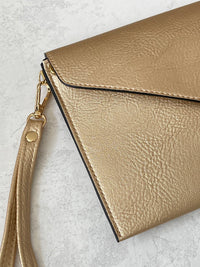 METALLIC GOLD OVER-SIZED ENVELOPE CLUTCH BAG WITH LONG CROSS BODY AND WRISTLET STRAP