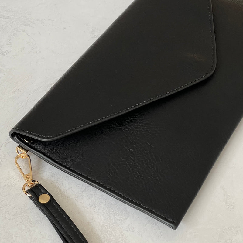BLACK OVER-SIZED ENVELOPE CLUTCH BAG WITH LONG CROSS BODY AND WRISTLET STRAP