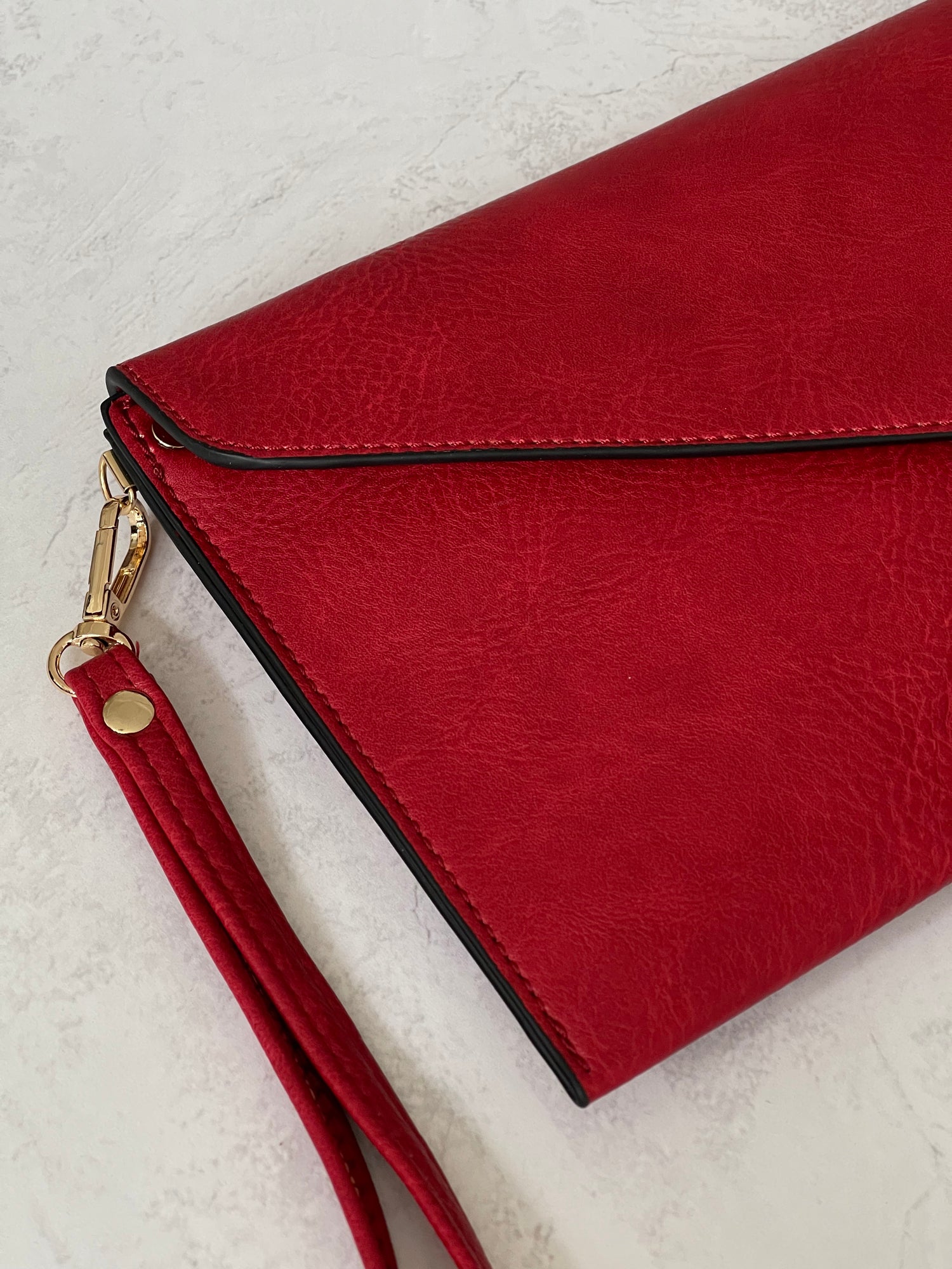 A SHU RED OVER SIZED ENVELOPE CLUTCH BAG WITH LONG CROSS BODY STRAP A SHU.CO.UK