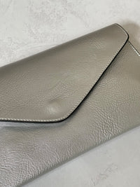 METALLIC SILVER OVER-SIZED ENVELOPE CLUTCH BAG WITH LONG CROSS BODY AND WRISTLET STRAP