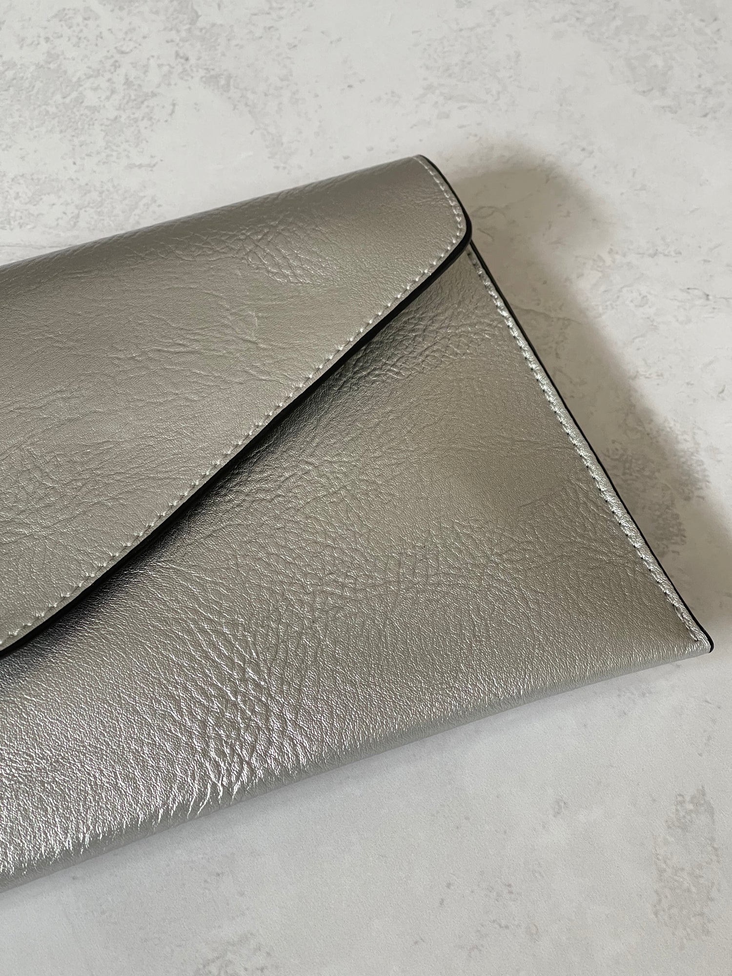 METALLIC SILVER OVER-SIZED ENVELOPE CLUTCH BAG WITH LONG CROSS BODY AND WRISTLET STRAP